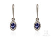 Tanzanite Oval Drop Earrings in White Gold Fancy Frame