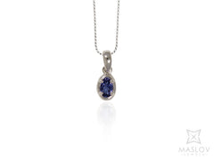 Oval Tanzanite White Gold Pendant in Solid Frame