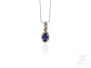 Oval Tanzanite White Gold Pendant in Solid Frame