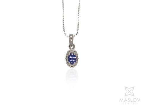 Oval Tanzanite Pendant in White Gold Fancy Frame and Chain