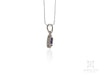 Oval Tanzanite Pendant in White Gold Fancy Frame and Chain